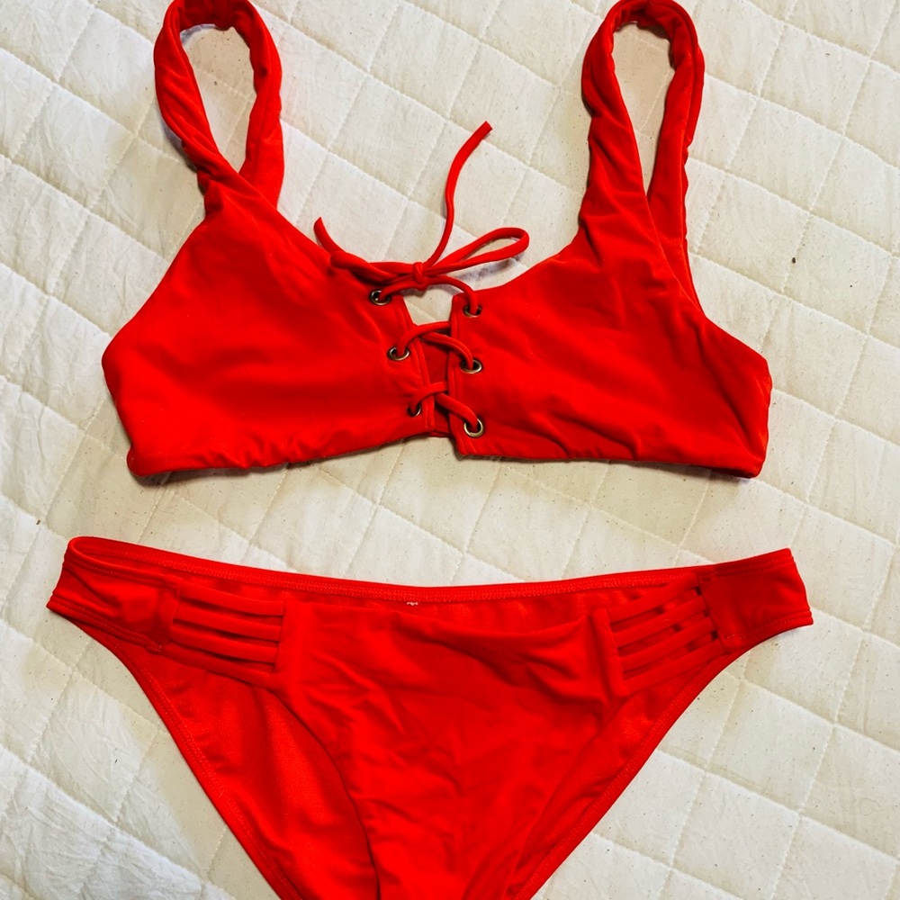 Red size M bikini. Top is pullover style